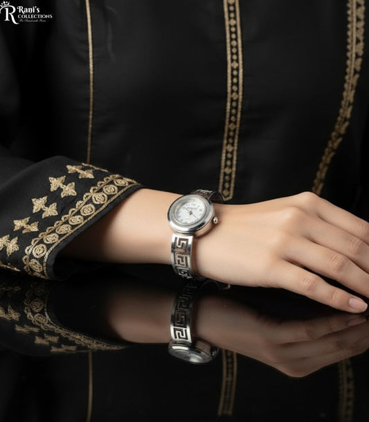 Silver tone Greek key cuff watch